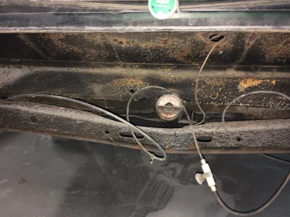Looks like this car had air shocks at onetime.
There is a thick coating of rust-proofing stuff on most metal parts.  
The Metal parts under the stuff looks good.  The rust-proofing stuff is also painted on the inside of the car too.