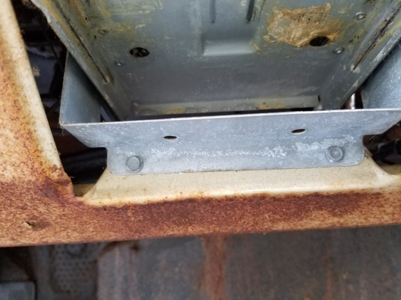 ash tray mounting bracket, this does not need to be removed but helps with more clearance and access. again I am not putting this car back together so helps to removed all I can for access.