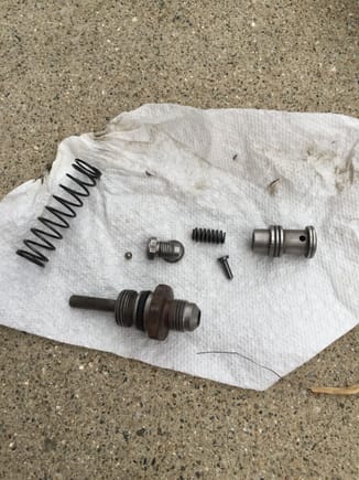 Union, disassembled valve, and spring.