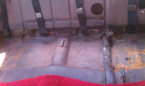 cutlass after removing back seat. amazed at the condition. Im thinking not so bad.