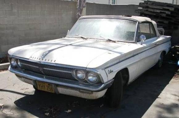 White 1962 F-85 Deluxe Series Cutlass Convertible. Just sold it on 7/8/2012. Auto trans, not running. White convertible top, red &amp; white interior. Appears complete.
My first car! Dad taught me how to work on my own car, starting with this one. He bought it in the early '80's, then I eventually gave it back to him, when I needed an everyday commuter car. My dad passed away in 2009 and I inherited all of his cars, including this one.