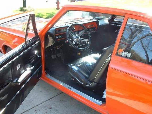 Interior shot, seats and console came out of a friends 67 GTO that was wrapped around a tree in 74 or 75, steering wheel mount is a custom aluminum piece. The warp in the dash board was caused by a penny in the AM radio (one of two options) the only way to dislodge it was to smack the top of the dash, the radio was removed in 1975.