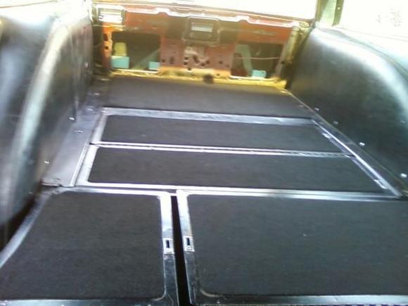 Carpet on the back of all the seats, and a peg board sub box cover!