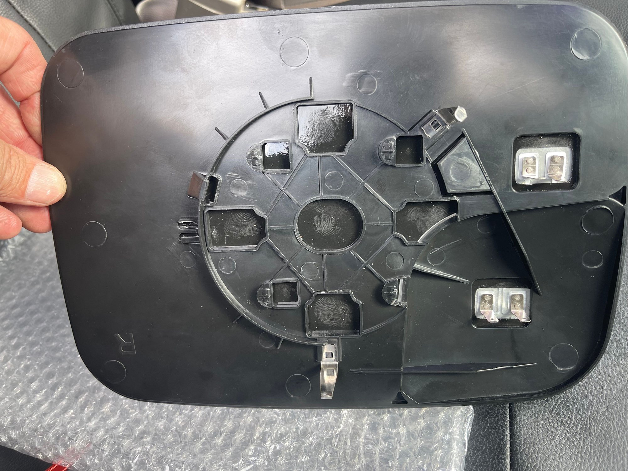 Replacement glass back (I broke one of the metal prong clips).