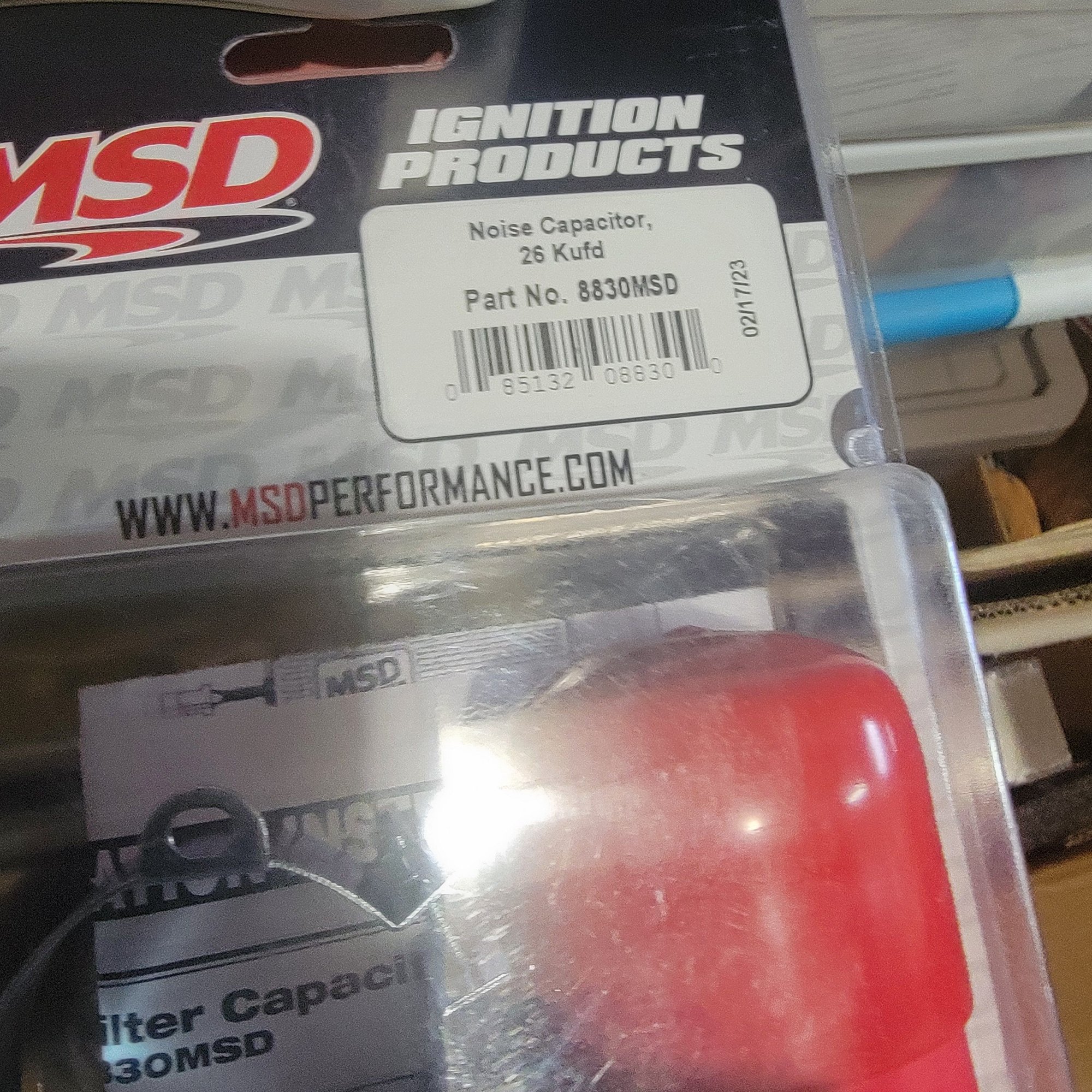 26Kmfd, 26,000 mfd? part# 8830MSD, actually it doesnt show the voltage its used with. Sometimes for a nomally 12v system the cap will be rated at 25+vdc? 
