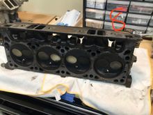 Passenger head. 8 has some more carbon buildup. 