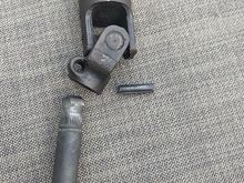 Use a 7/32 allen key as a punch and drive out that pin (if you haven't already done so when pulling the rack)