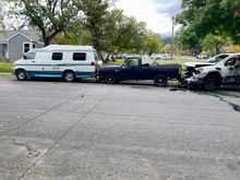 Hit while parked. 1987 D150 & 1999 B350 RV. 