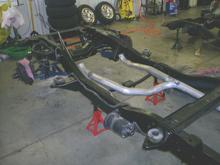 stanleys pics 2/Welded 3in JETHOT ceramic coated exhaust, no clamps.Designed by "Doug"at Performance Muffler.Cooler temps for the tranny, and it doesn't need removed to pull the tranny to work on.