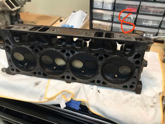 Passenger head. 8 has some more carbon buildup. 