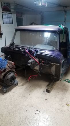 The cab, engine, transmission and tires are all snuggled in the garage. Ill clean and rearrange tomorrow between church, and start getting things sorted. Then Ill start seeing what atrocities he performed on the cab, and try some damage control. 