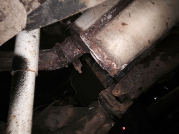 crack where pipe is severed is black line very close to muffler end of pipe