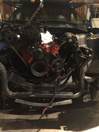 318 sitting high with oil pan touching cross member. Engine is back all the way