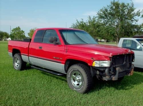 Angled view of the truck with some of the front end parts taken off.