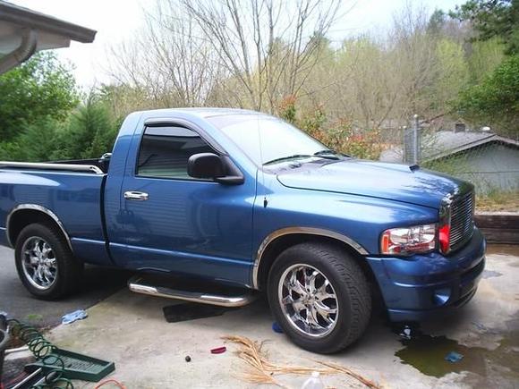 my first ram, 2004 sc 3.7L 5speed. added the sport clip on the front, 20'' pacers, super 40 flows, cold air, cc halos, led tails and third,spray in bed liner, clarion flip up head unit, kicker l7 12'' subs in a homemade box. had it for 78,000 miles wercked it 3 times and had 3 long term relationships and 1 marriage porposale in the truck! but only 1 3.7L that saw 5500 on a daily basis!