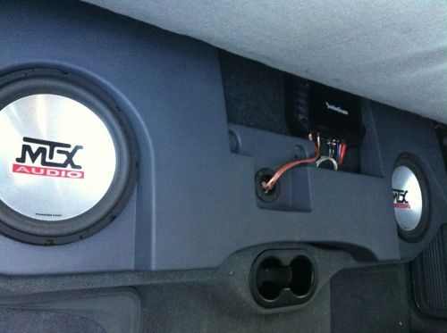 MTX Thunderform with 2 MTX 10" subs.  RF Power T400.2 amp bridged.