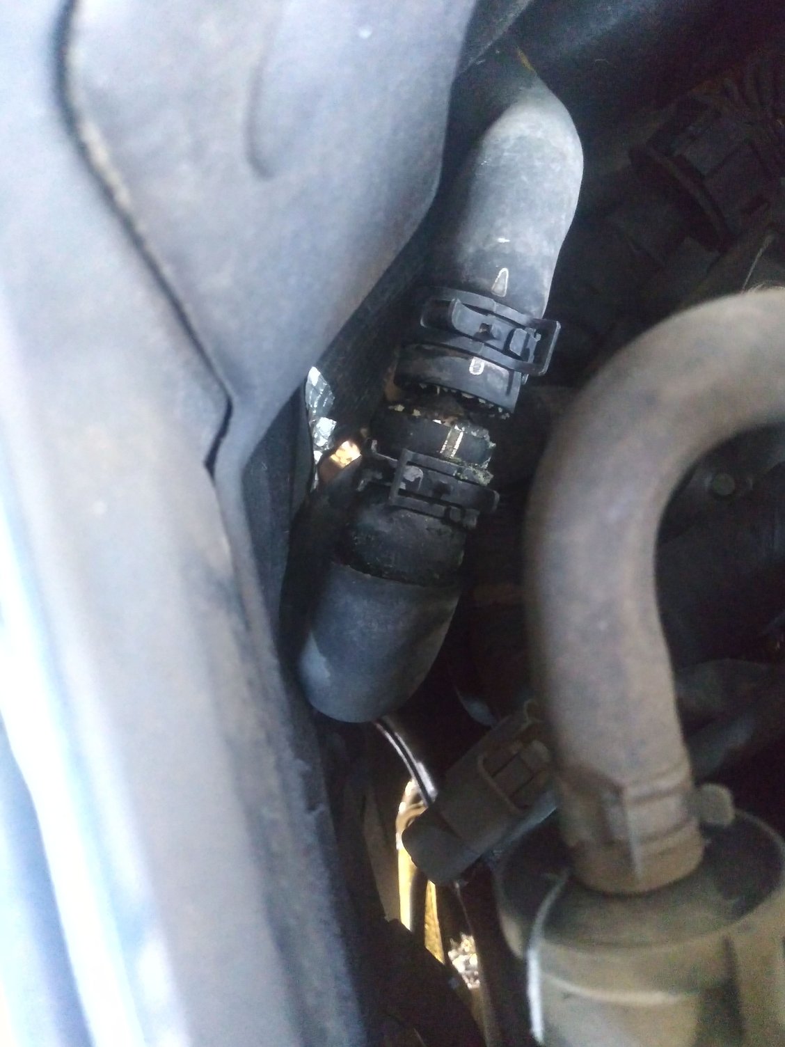 Coolant heater hose connector replacement but still having mystery