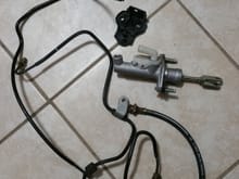 OEM Clutch master cylinder and lines with bracket