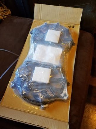 Radiator fans finally in the mail! I have never seen a car part packaged like meat.