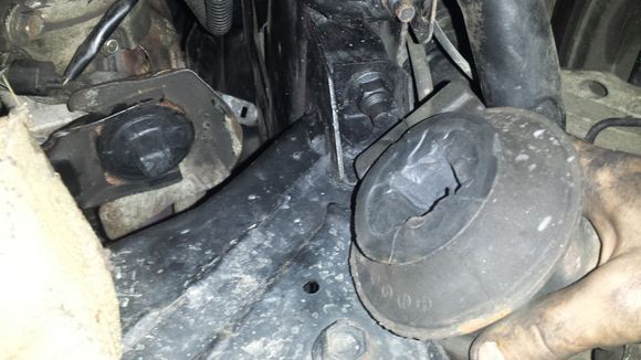Took off bottom mount nut and jacked up engine trying to get more room, this is what the better of the two mounts looks like...