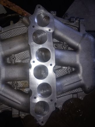 Cleaned up the casting a bit in the ports.