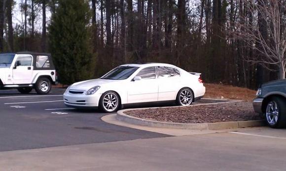 sittin at work outside the dealership