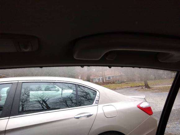 Water droplets on rear window, from inside looking out. Same on front window.