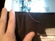 Sewing the top stitch on the alcantara door card trim