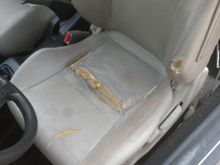 The ripped up drivers seat