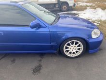 Replacement OEM fender, lucked out finding a blue one but you can see the color is off. Paint/side marker later. 