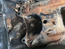 Bolt holding battery tray down is stripped.