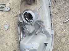 Here's the old driver crap headlight. Deer did this. All tabs broken and cracked case.