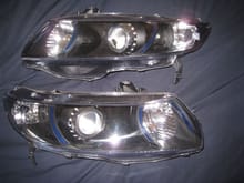 06-11 civic coupe

rx330 w/ tsx-r lenses
e46r shrouds
blue painted strips around low beam and high beam area
