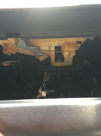 Realized with the radio stuff out of the way I can adjust the heat with this lever, by hand.