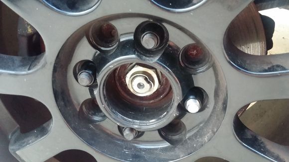 Installed photo. Im very happy. If you looking for a cheap alternative for extended lugs i bought all 8 for under 20 bucks.