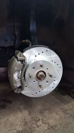 Drilled and slotted, Carbon ceramic pads. painted and cleaned up!