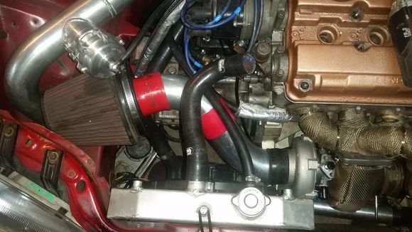 I was able to straighten out the raditor because of the new compressor housing and use old 3in piping and v stack from my old na b20v. New couplers and filter and itll be ready to rock.