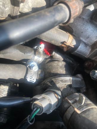 Red rag part is stopping coolant from leaking out