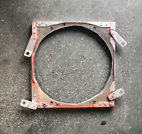 Made little aluminum brackets to attach to the radiator