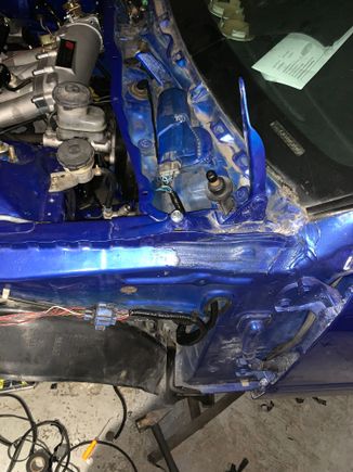 I make the brake light wires go out of the same hole where the wiper motor wires used to go into. Used the factory grommet. 