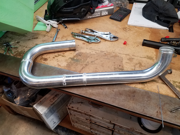 Hot side charge pipe welded together.
