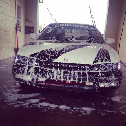 At the car wash giving her a bath