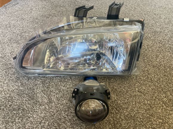 Morimoto Mini H1 8.0 going into a Spec D housing.