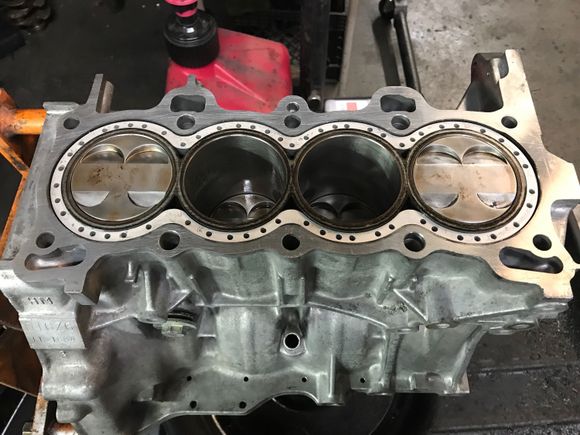 Back from the dead with an update. New block is dont and built by Ngoc at synergy auto works. Here we have 10.5:1 compression srp pistons on eagle rods. I had the head ported by a buddy of mine and then took it to Felix at Apm to do a valve job and throw new seals in it. Just waiting on motor mounts now and back in the car we go.
