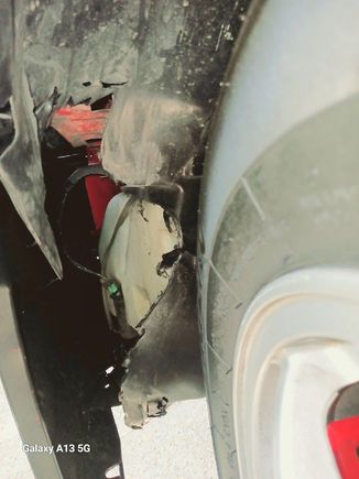 Inner fender zip tied while waiting on another