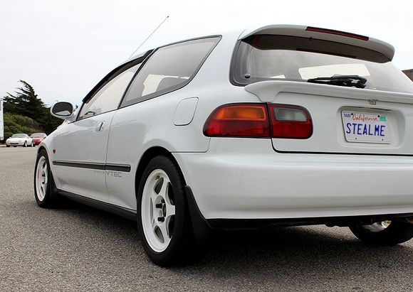 Rear quarter shot showcasing EDM mid spoiler.