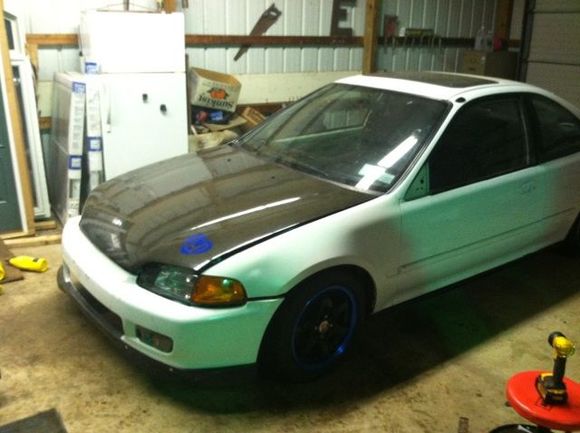 Almost ready for spring (hood was not closed and the bumper wasnt bolted on, so thats why they look crooked)