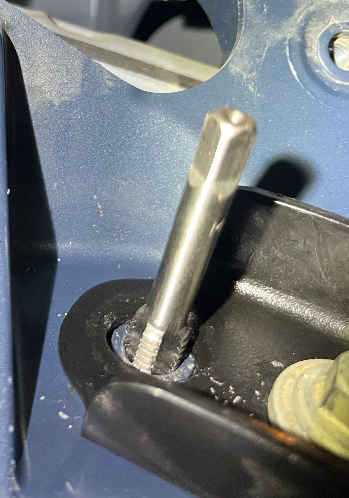 Recut the thread for the M10 bolt cross threaded at an earlier time. Engine cross member. Recut an M10 bolt I had from the AC armor to match. All good again. 