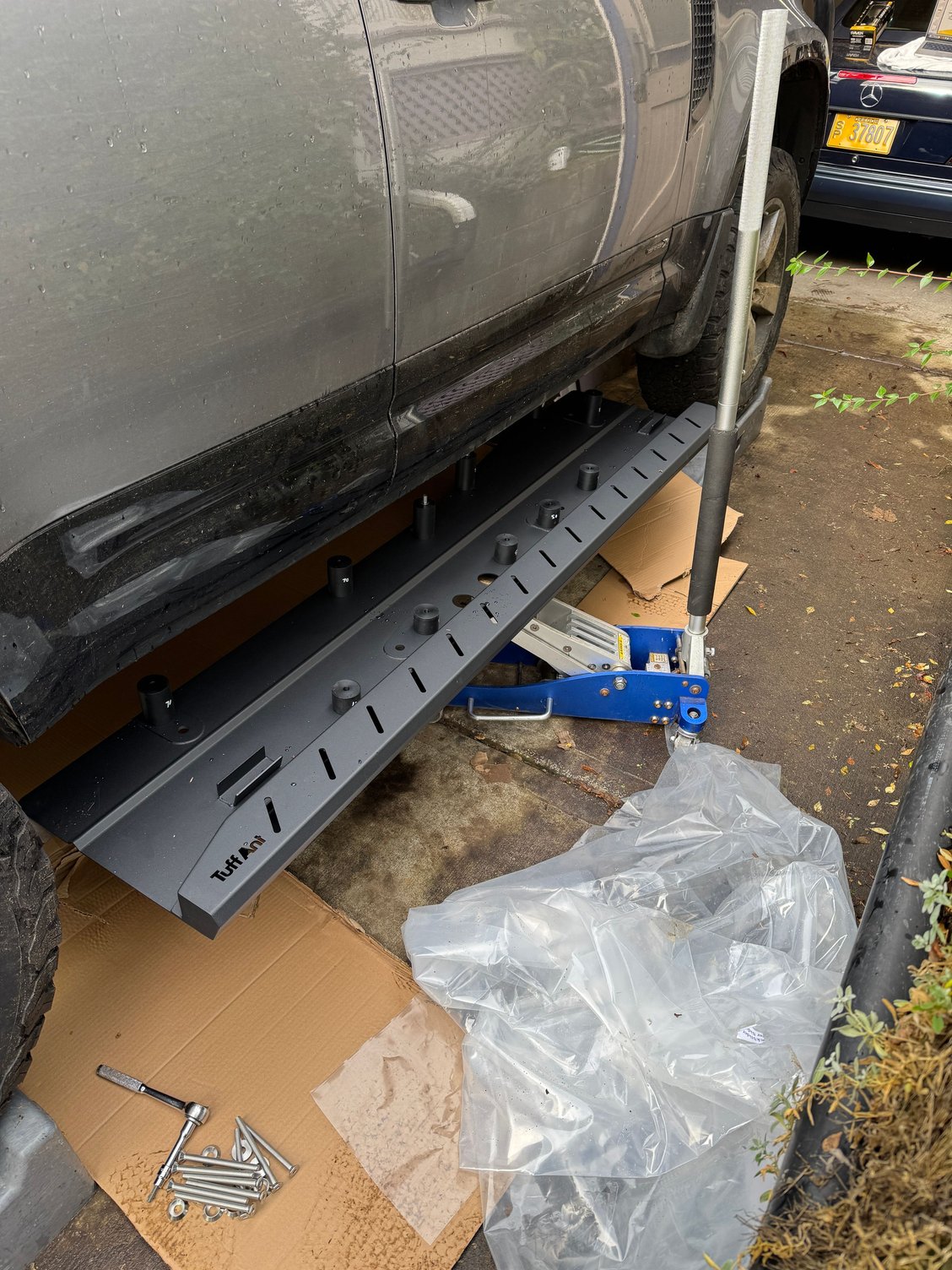 Jacking. I put cardboard down. Unsure why since theyre going to get scuffed up. 