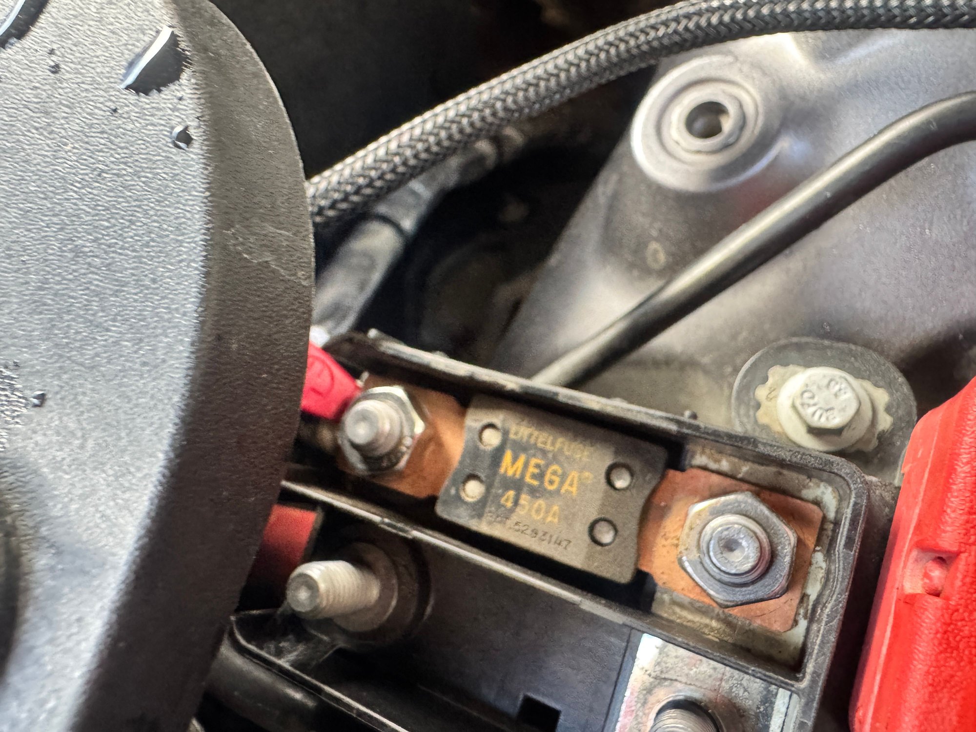 + connection (I already had the fuse in here from my winch install so it was easy for me...) You really don�t need a fuse for the batt charger, you could just put it on either bolt on the right of this pic in theory, but a fuse is probably a better idea.. now that I think about it. 